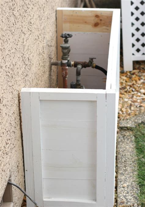 hide electric water timer sprinkler box cover|how to hide a water sprinkler.